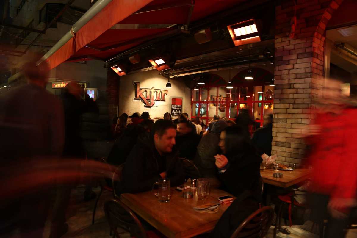 people enjoying a laidback night in a bar