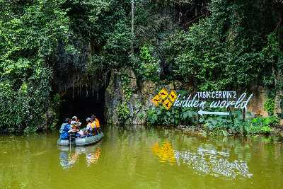 Ride a boat on Tasik Cermin